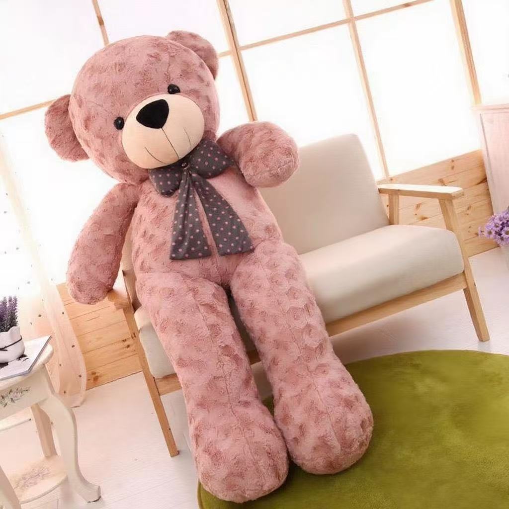This large teddy bear plush toy is made from high-quality, soft velvet and filled with plush PP cotton to provide gentle comfort. Featuring a charming polka dot bow tie, it’s perfect as a cozy sleeping pillow or a thoughtful birthday gift for girls.