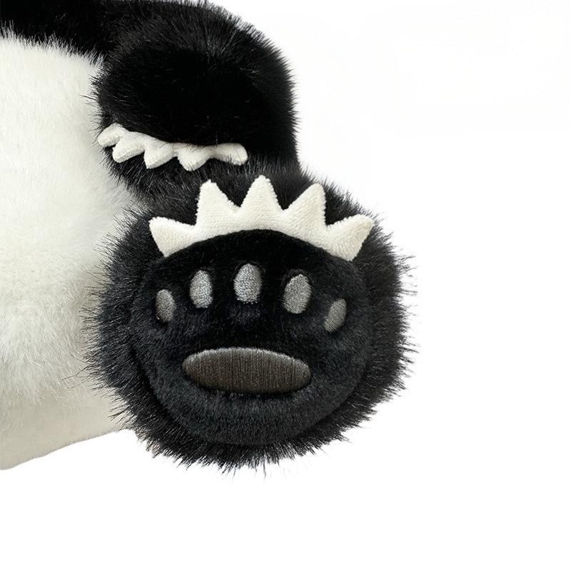 Lifelike giant panda plush toy, classic black and white color scheme, cute sitting posture