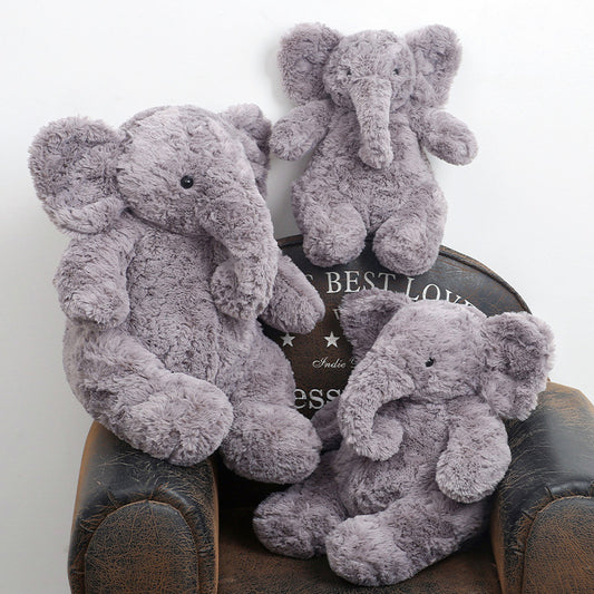 Fluffy Gray Elephant Plush toy.The sweet, floppy ears and curled trunk give it an adorable, timeless look that steals hearts instantly.Its fluffy, cloud - like fur is perfect for cozy snuggles—ideal for both kids and adults seeking comfort.