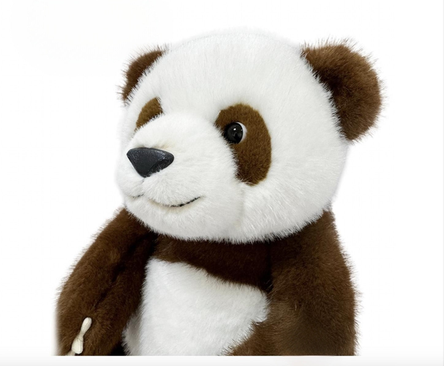 Lifelike giant panda plush toy, unique brown and white color scheme, and cute sitting posture