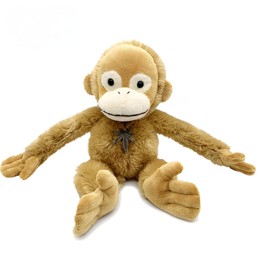 Adorable brown monkey plush toy, featuring a cute face, long limbs, and a leaf pendant on its chest, perfect as a kids' companion or decorative gift