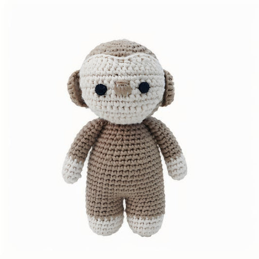 This is a pure hand-knitted monkey plush toy. It has a friendly and playful expression.It does not require glue, is made of pure cotton, feels soft, is safe and environmentally friendly, and is no problem for babies to bite.
